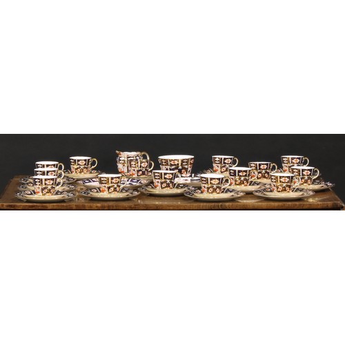 203 - An extensive Royal Crown Derby 2451 pattern tea set, including fourteen cups, fifteen saucers, thirt... 