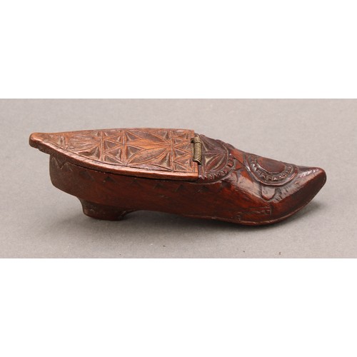 1412 - A 19th century chip-carved novelty snuff box, as a shoe, hinged cover, 11.5cm long