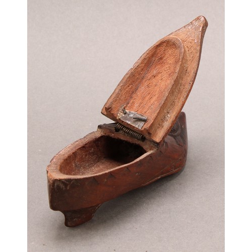 1412 - A 19th century chip-carved novelty snuff box, as a shoe, hinged cover, 11.5cm long