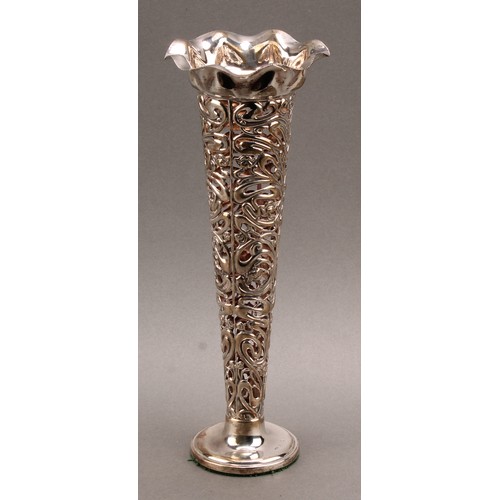 997 - An Art Nouveau silver trumpet shaped table centre vase, pierced and embossed with organic whiplash m... 