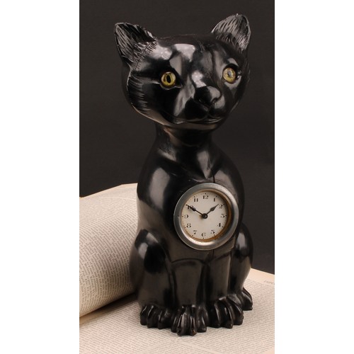 2340 - An early 20th century ebonised novelty timepiece, carved in the Black Forest manner as a seated cat ... 