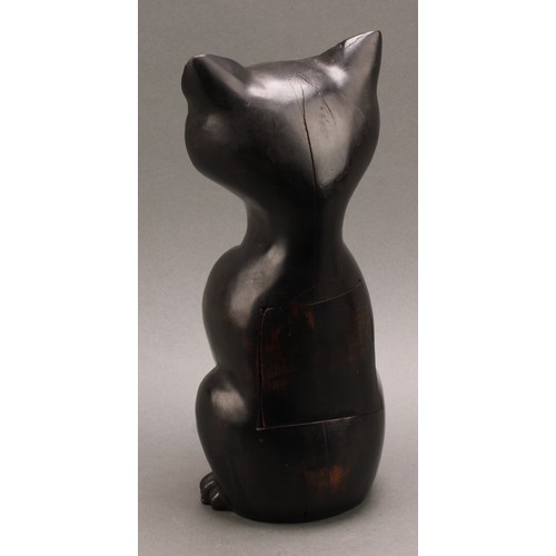 2340 - An early 20th century ebonised novelty timepiece, carved in the Black Forest manner as a seated cat ... 