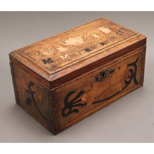 2213 - A 19th century vernacular oak and marquetry rectangular tea caddy, inlaid in the folk art manner wit... 