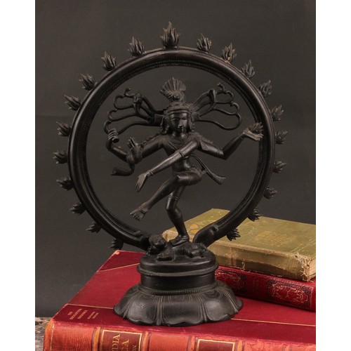 1372 - Indian School, a dark patinated bronze, Shiva Nataraja, lotus base, 31cm high