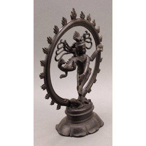 1372 - Indian School, a dark patinated bronze, Shiva Nataraja, lotus base, 31cm high