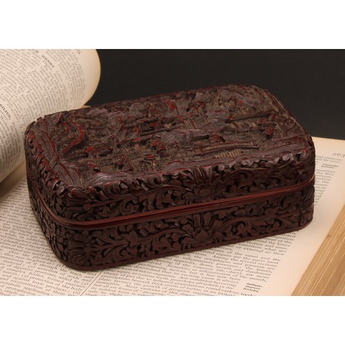 1279 - A Chinese cinnabar lacquer rounded rectangular box and cover, deeply carved with figures and pagodas... 