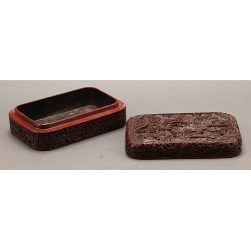 1279 - A Chinese cinnabar lacquer rounded rectangular box and cover, deeply carved with figures and pagodas... 