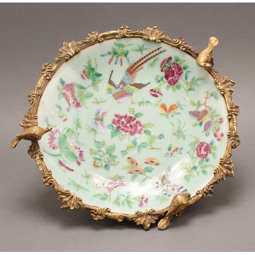 1293 - A 19th century gilt metal mounted Chinese dish, painted in the famille rose pallette in the Cantones... 