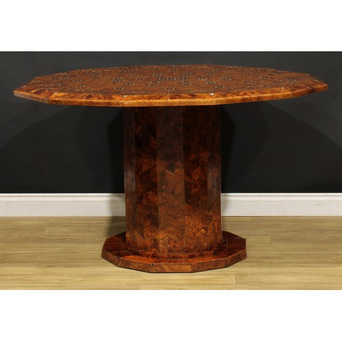 1507 - An Art Deco design burr yew, amboyna and mother of pearl parquetry dodecagonal centre table, the top... 