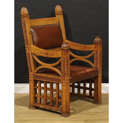 1511 - An Arts & Crafts oak and parquetry armchair, in the manner of Ambrose Heal, 110.5cm high, 68cm wide,... 