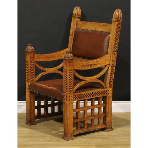 1511 - An Arts & Crafts oak and parquetry armchair, in the manner of Ambrose Heal, 110.5cm high, 68cm wide,... 