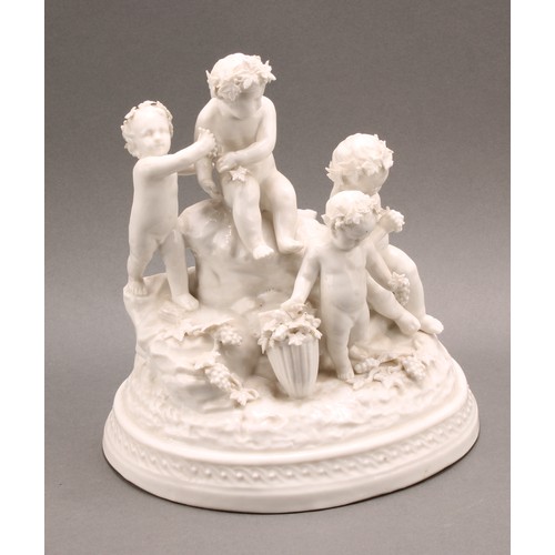 216 - A 19th century Italian blanc de chine porcelain figure group, of four putti gathering fruiting vine ... 