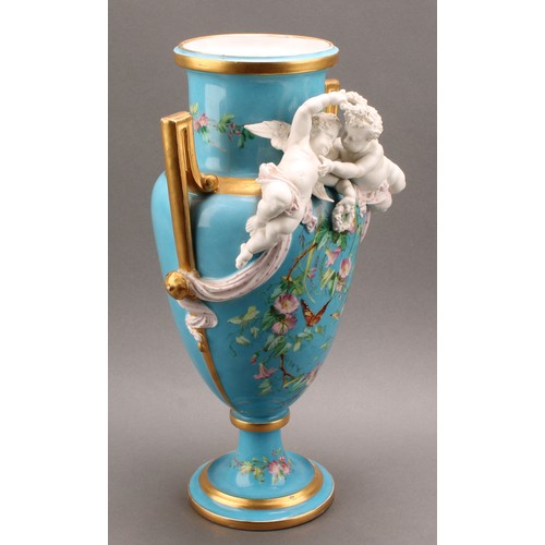 251 - A pair of French porcelain two handled pedestal urnular vases, in the manner of Sevres, painted with... 