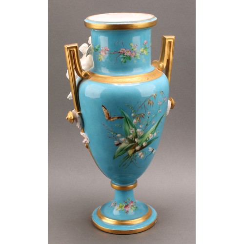 251 - A pair of French porcelain two handled pedestal urnular vases, in the manner of Sevres, painted with... 