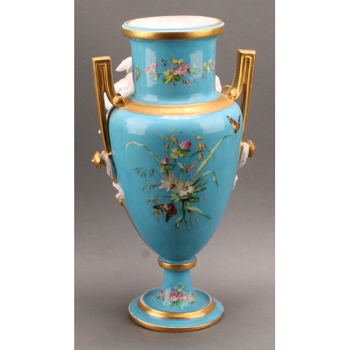 251 - A pair of French porcelain two handled pedestal urnular vases, in the manner of Sevres, painted with... 