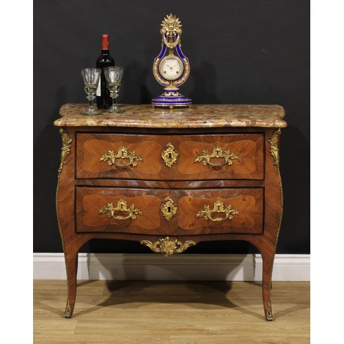 1883 - A 19th century French Louis XV Revival gilt metal mounted kingwood serpentine commode, marble top ab... 