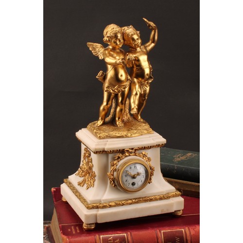 2447 - A French Louis XVI Revival gilt metal and marble clock, Arabic numerals on a 5cm circular white enam... 