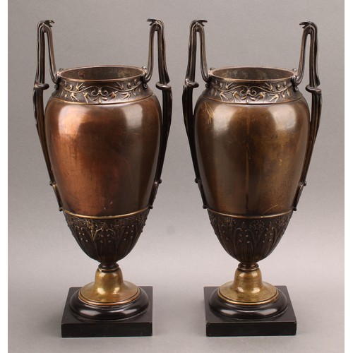 2085 - A pair of French Grecian Revival bronze-patinated ovoid mantel vases, each lofty handle cast with a ... 