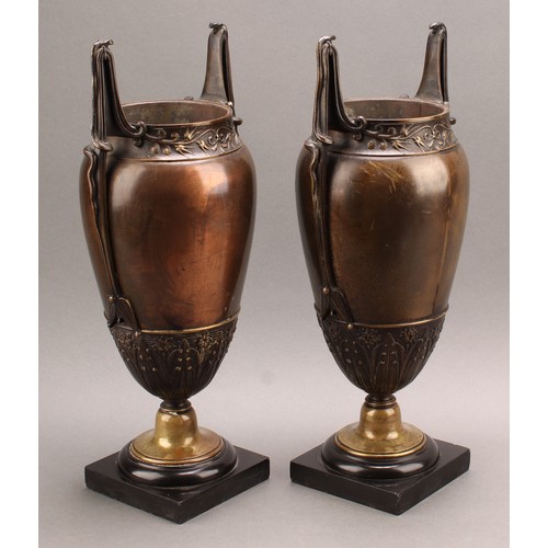 2085 - A pair of French Grecian Revival bronze-patinated ovoid mantel vases, each lofty handle cast with a ... 