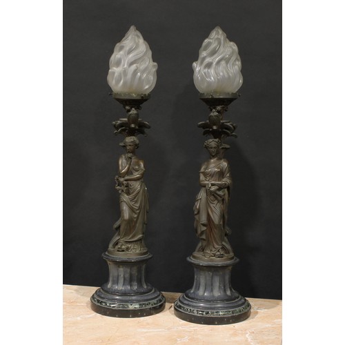 2084 - A pair of French brown patinated bronze figural table lamps, cast as personifications of music and l... 