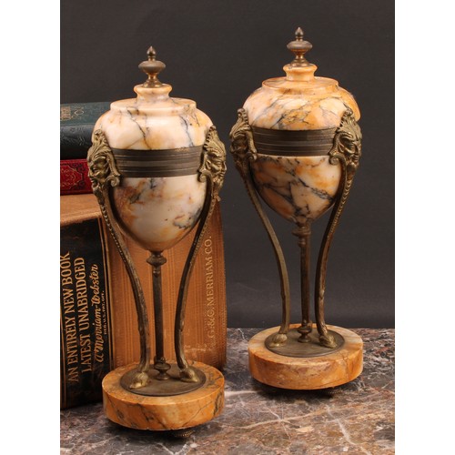 2086 - A pair of Louis XVI Revival gilt metal mounted marble mantel urns, 29.5cm high, early 20th century