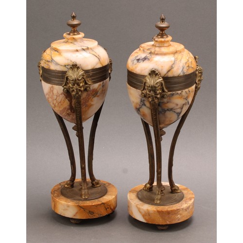 2086 - A pair of Louis XVI Revival gilt metal mounted marble mantel urns, 29.5cm high, early 20th century