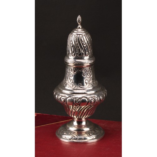 1025 - An Edward VII silver spirally stop fluted pedestal sugar caster, spiral knop finial, pierced bell sh... 