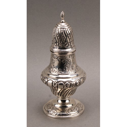 1025 - An Edward VII silver spirally stop fluted pedestal sugar caster, spiral knop finial, pierced bell sh... 