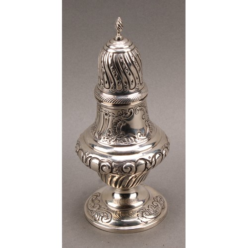 1025 - An Edward VII silver spirally stop fluted pedestal sugar caster, spiral knop finial, pierced bell sh... 