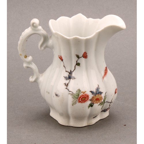 166 - An early Worcester Flowering Grasses pattern lobed baluster cream jug, painted in polychrome, double... 