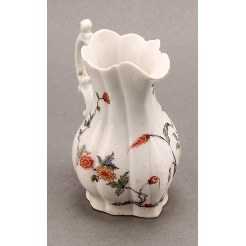 166 - An early Worcester Flowering Grasses pattern lobed baluster cream jug, painted in polychrome, double... 