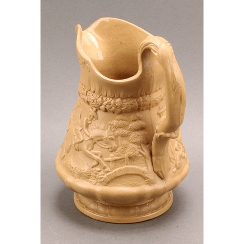 17 - An early Victorian William Ridgway & Co. relief moulded buff jug, with Tam O' Shanter scenes, 20cm h... 