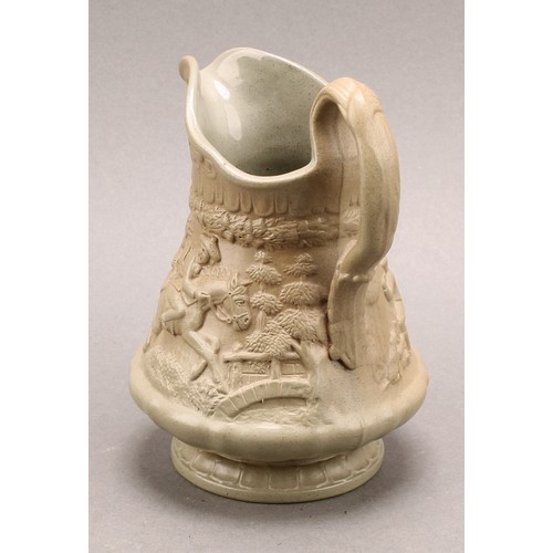 17 - An early Victorian William Ridgway & Co. relief moulded buff jug, with Tam O' Shanter scenes, 20cm h... 