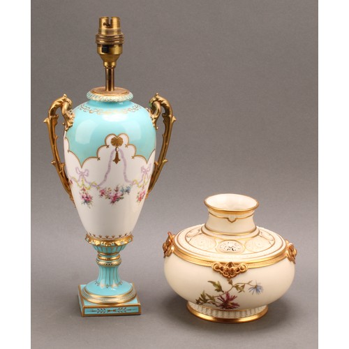 109 - A Royal Worcester reticulated pot pourri vase, decorated with floral sprigs, on a blush ivory ground... 