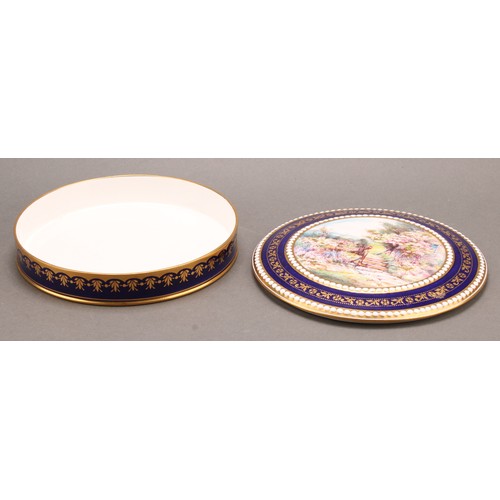 195 - A Royal Crown Derby circular compressed box and cover, painted by John Porter Wale, signed, with an ... 