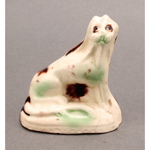 30 - An 18th century Staffordshire creamware figure of a lion, whieldon type, 6.5 cm high