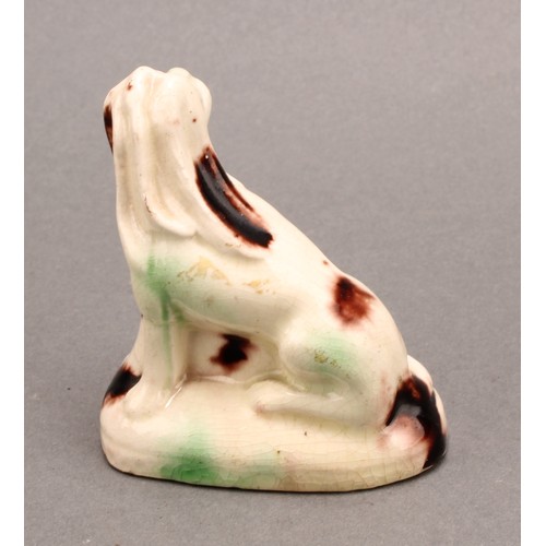 30 - An 18th century Staffordshire creamware figure of a lion, whieldon type, 6.5 cm high