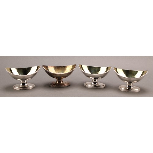 1134 - The Bateman Family - a set of four George III silver navette shaped pedestal salts, beaded borders, ... 