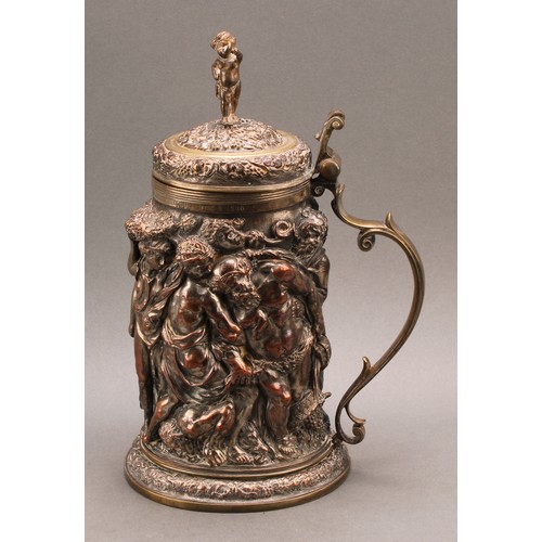 698 - A Victorian Historicist parcel-gilt electrotype flagon, after a 17th century example, a Bacchanalian... 