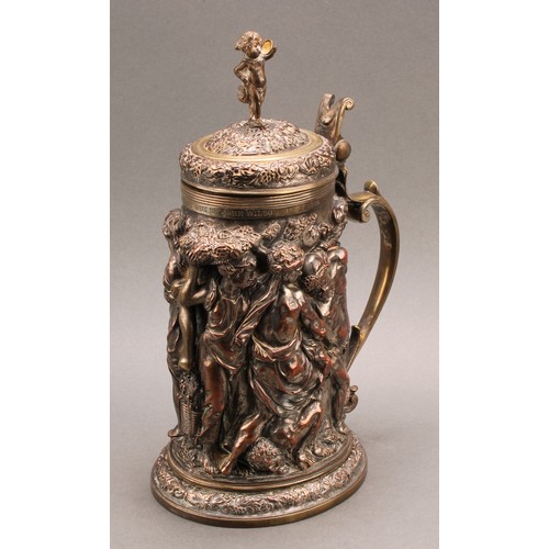 698 - A Victorian Historicist parcel-gilt electrotype flagon, after a 17th century example, a Bacchanalian... 