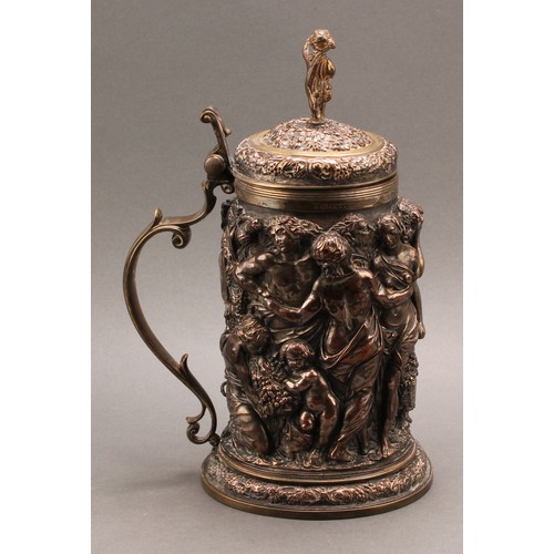 698 - A Victorian Historicist parcel-gilt electrotype flagon, after a 17th century example, a Bacchanalian... 