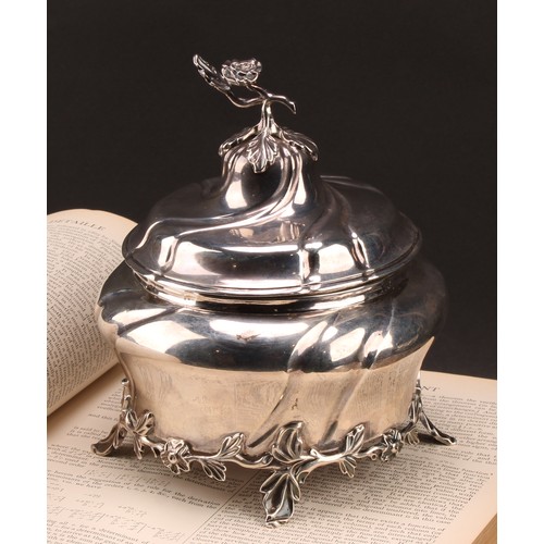 979 - An 18th century Dutch silver wrythen-fluted ogee biscuit box, rose finial, leafy skirted base, 20cm ... 