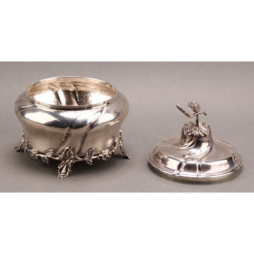 979 - An 18th century Dutch silver wrythen-fluted ogee biscuit box, rose finial, leafy skirted base, 20cm ... 