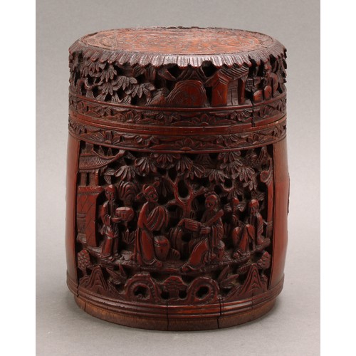 1373 - A pair of Chinese export bamboo tea caddies, each carved with narrative scenes with figures in a lan... 