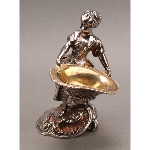 682 - A pair of Rococo Revival silver plated figural salts, cast as a fisher boy and girl holding baskets,... 