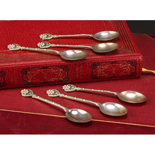 909 - A set of six Art Deco silver and enamel coffee spoons, each stem decorated with a flower, 9cm long, ... 