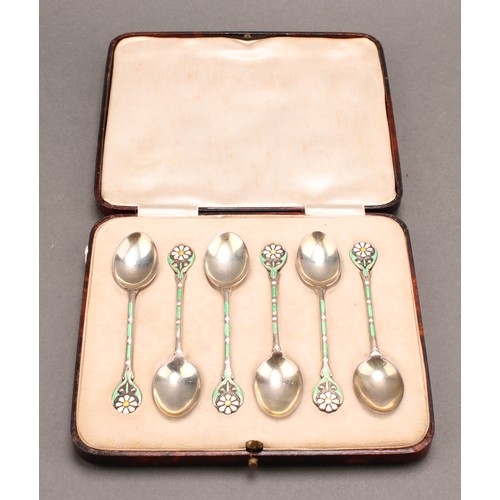 909 - A set of six Art Deco silver and enamel coffee spoons, each stem decorated with a flower, 9cm long, ... 