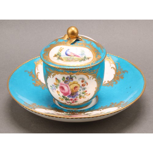 268 - A Sevres porcelain chocolate cup and cover, with stand, painted in polychrome, the cup and cover wit... 