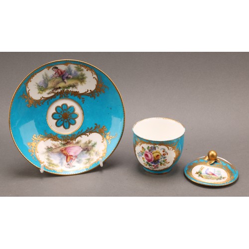 268 - A Sevres porcelain chocolate cup and cover, with stand, painted in polychrome, the cup and cover wit... 