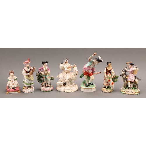 178 - A Derby porcelain figure, The Welch Tailor, he seated astride a goat, he wearing a tricorn hat with ... 